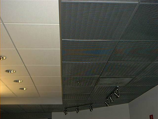 Ceiling cloud transitioning to open structure