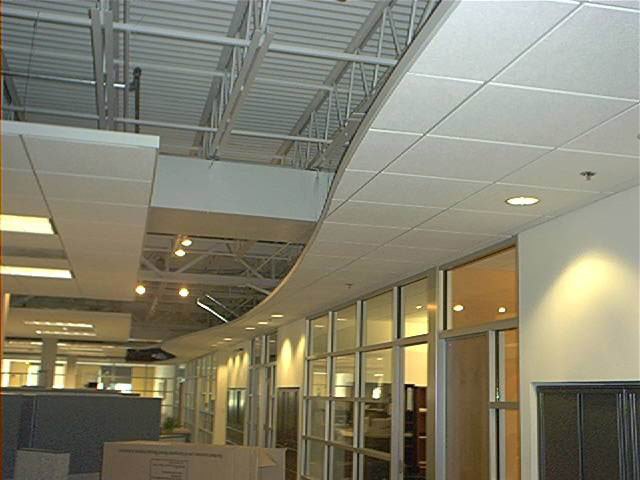 Curved acoustical cloud transition