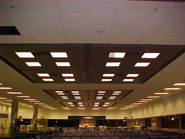 Layered commercial ceiling with recessed lighting