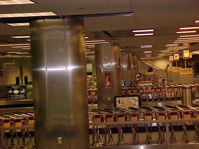 Stainless column cover in a finished interior
