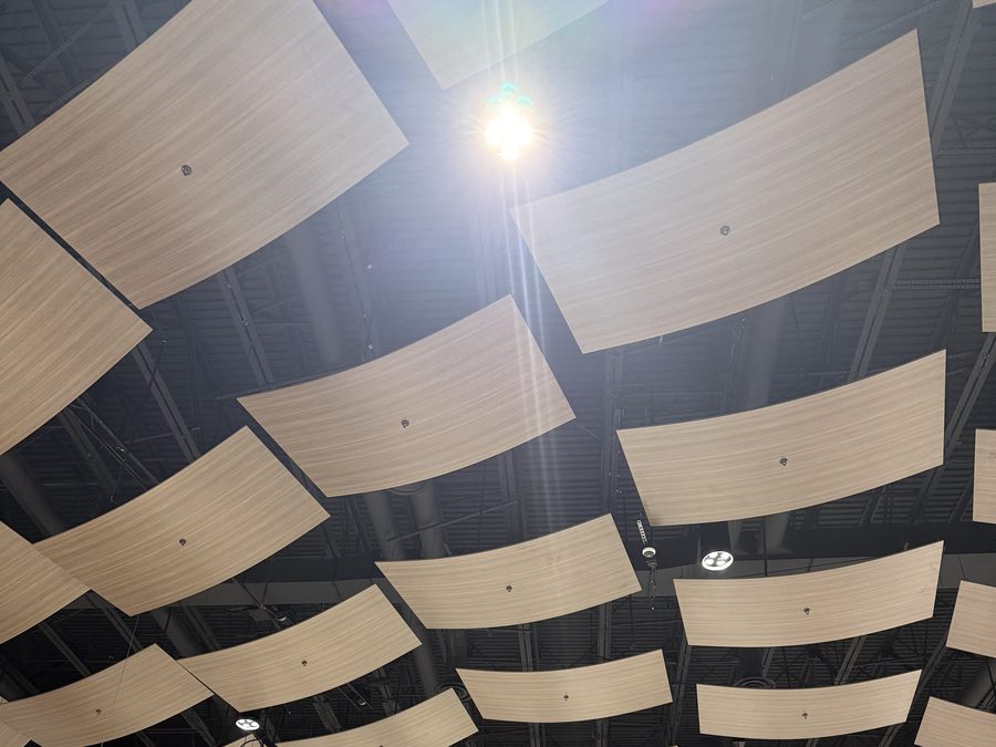 Close detail of suspended curved acoustical panels