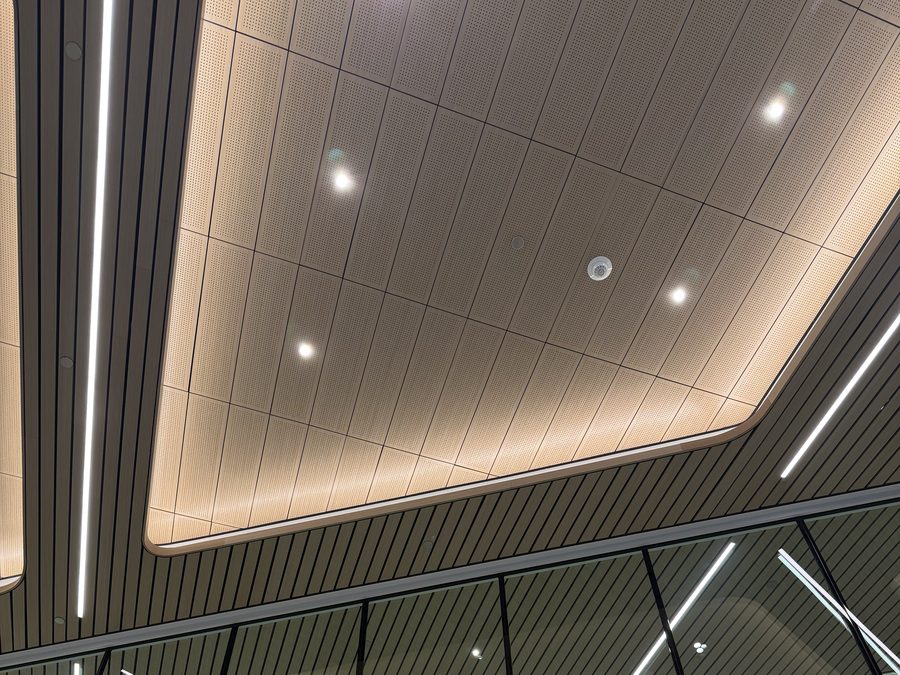 Illuminated ceiling panel and linear slat detail