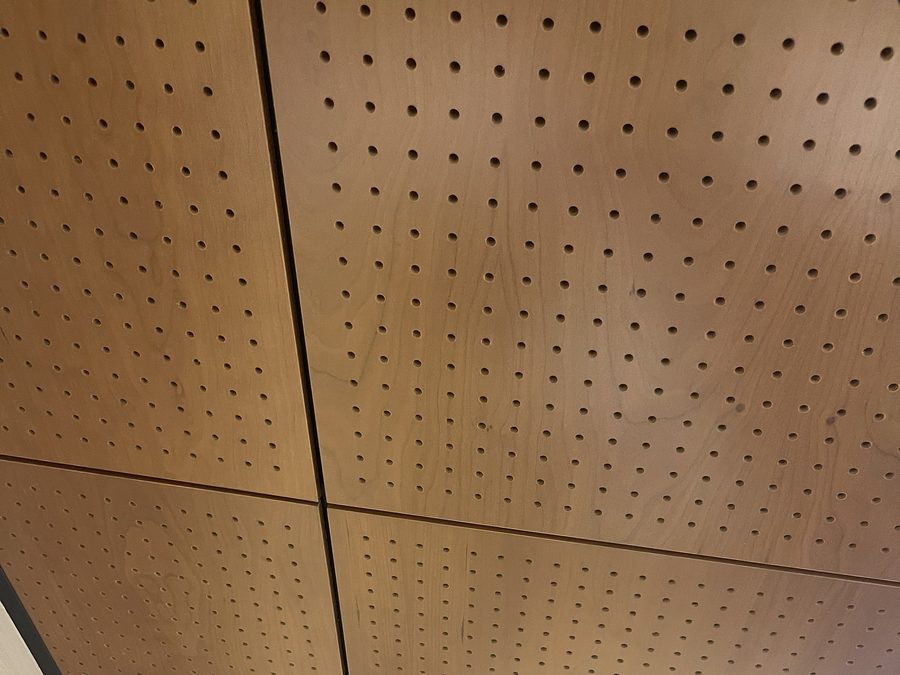 Perforated wood-look acoustical ceiling panels