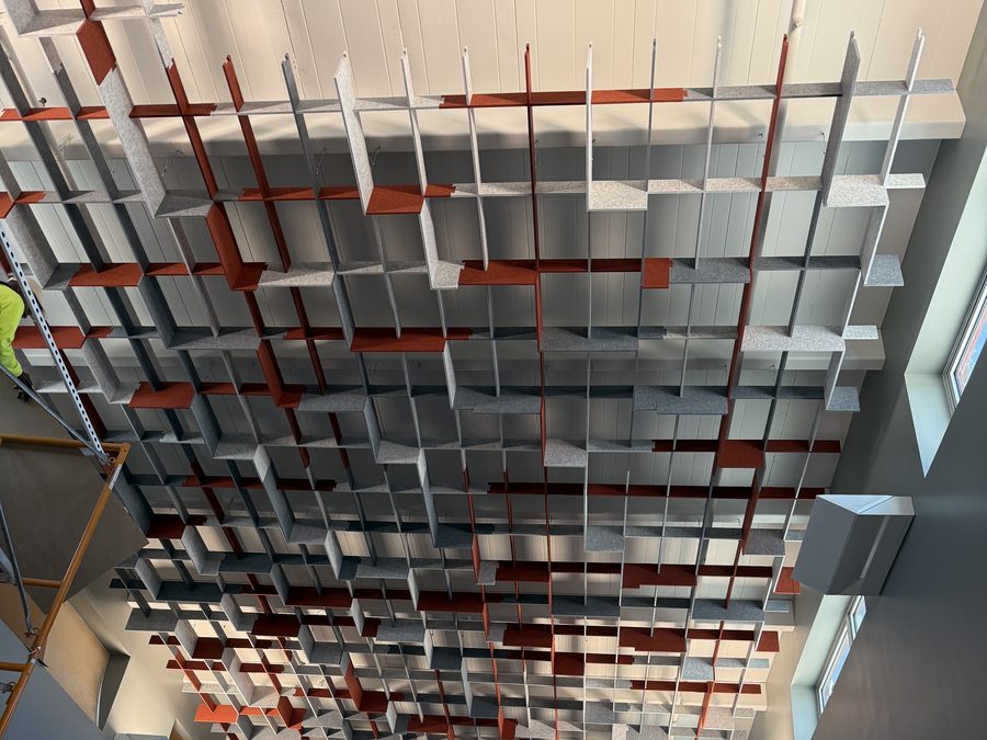 Layered red and gray acoustical baffle array
